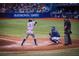 A baseball player is up to bat, ready to hit the ball at a Raymond James stadium at 6062 Spinnaker Blvd, Englewood, FL 34224