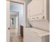 Laundry area featuring a washer/dryer combo in the bathroom at 6062 Spinnaker Blvd, Englewood, FL 34224
