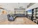 Spacious living room with tile floors, vaulted ceilings, and a large sectional sofa at 6062 Spinnaker Blvd, Englewood, FL 34224