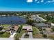 A high-angle aerial view of the residence featuring meticulously manicured landscaping at 6305 Shalimar St, Port Charlotte, FL 33981