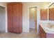 Bathroom with a tiled floor, storage and vanity with a sink at 6305 Shalimar St, Port Charlotte, FL 33981