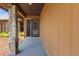 Inviting front entrance with stone accents and neutral tones adding to the home's curb appeal at 6305 Shalimar St, Port Charlotte, FL 33981