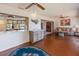 Open-concept living space with a wet bar, seamlessly connecting to the kitchen at 6305 Shalimar St, Port Charlotte, FL 33981