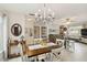 Open floor plan featuring a dining room leading into the living room at 667 Foxwood Blvd, Englewood, FL 34223