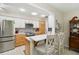 Kitchen area with stainless steel appliances, quartz countertops, and an open layout at 667 Foxwood Blvd, Englewood, FL 34223
