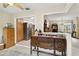Open-concept living space showcasing a kitchen, dining area, and decorative furniture at 667 Foxwood Blvd, Englewood, FL 34223
