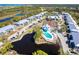 Community view of complex near tennis court, pool, and waterways at 6800 Placida Rd # 262, Englewood, FL 34224