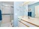 Charming bathroom with a glass shower, white vanity, and coastal accents at 6800 Placida Rd # 262, Englewood, FL 34224