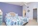 Light-filled bedroom featuring a lovely bed, and easy access to the bathroom and closet at 6800 Placida Rd # 262, Englewood, FL 34224