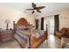 Bedroom featuring a ceiling fan, tile flooring, and french doors providing access to a private outdoor area at 7089 Benson St, Englewood, FL 34224