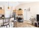 Well-equipped kitchen showcasing a breakfast bar with seating, appliances, and ample cabinet space at 7089 Benson St, Englewood, FL 34224