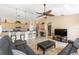 Open-concept living area combining the kitchen and living spaces for seamless entertaining and relaxation at 7089 Benson St, Englewood, FL 34224