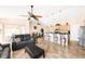 Spacious living area with an open layout connecting the kitchen, dining area, and living room at 7089 Benson St, Englewood, FL 34224