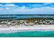 Breathtaking aerial vista featuring beachfront houses with oceanfront views and bay views at 7554 Palm Island S Dr # 1822, Placida, FL 33946