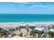 Beautiful beachfront properties with white exteriors, set against the stunning backdrop of the ocean at 7554 Palm Island S Dr # 1822, Placida, FL 33946