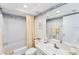 This white bathroom features a shower-tub combination and vanity at 7554 Palm Island S Dr # 1822, Placida, FL 33946