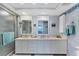 Bright bathroom featuring a double vanity, updated fixtures, and a walk-in shower at 7554 Palm Island S Dr # 1822, Placida, FL 33946