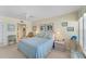 Bright bedroom featuring an ocean view, cool-tone decor, and neutral carpet at 7554 Palm Island S Dr # 1822, Placida, FL 33946