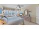 A bright and airy bedroom features ocean views and coastal-themed decor at 7554 Palm Island S Dr # 1822, Placida, FL 33946