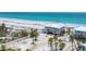 Lovely coastal home with white exterior, multiple balconies, and beach access, showcasing a serene waterfront lifestyle at 7554 Palm Island S Dr # 1822, Placida, FL 33946