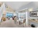 Open floor plan living and dining area featuring lots of natural light, beach views, and stylish décor at 7554 Palm Island S Dr # 1822, Placida, FL 33946