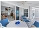 Relaxing porch with ocean view through sliding glass doors, comfortable seating, and stylish decor at 7554 Palm Island S Dr # 1822, Placida, FL 33946