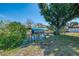 Picturesque canal view featuring a private boat dock with a covered lift for boating enthusiasts at 842 E 6Th St, Englewood, FL 34223