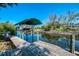 Waterfront home features a private boat dock with lift, providing direct access to the canal and open water at 842 E 6Th St, Englewood, FL 34223