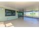 Spacious screened-in patio offering ample space for outdoor enjoyment and entertaining at 842 E 6Th St, Englewood, FL 34223