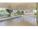 Large screened patio overlooking a waterfront, ideal for outdoor entertaining and relaxation at 842 E 6Th St, Englewood, FL 34223