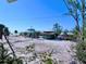 Quaint coastal community with charming beach houses and sandy streets at 8472 Grand Ave, Placida, FL 33946