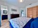 Bedroom features a view into the bathroom at 8472 Grand Ave, Placida, FL 33946