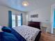 Bedroom with a bed and dresser at 8472 Grand Ave, Placida, FL 33946