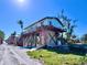 Coastal home on stilts boasts a deck, beach access and scenic views at 8472 Grand Ave, Placida, FL 33946