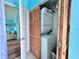 Laundry closet with stackable washer and dryer at 8472 Grand Ave, Placida, FL 33946