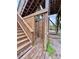 Stairs and wooden outdoor shower for rinsing off after the beach at 8472 Grand Ave, Placida, FL 33946