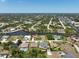 Expansive aerial view of a waterfront community with canals and single-Gathering homes at 9158 Melody Cir, Port Charlotte, FL 33981
