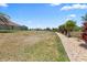 Large backyard offering ample space with some grass and rock landscaping at 9158 Melody Cir, Port Charlotte, FL 33981