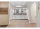 Spacious main bathroom with dual sinks, tile floors, and a large step-in shower with tile surround at 9158 Melody Cir, Port Charlotte, FL 33981