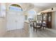 Bright dining room with elegant furniture, tile flooring, and lots of natural light at 9158 Melody Cir, Port Charlotte, FL 33981