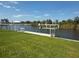 Waterfront home boasts a private dock, perfect for boating and enjoying the serene water views at 9158 Melody Cir, Port Charlotte, FL 33981