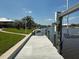 Private dock on the waterfront with boat lift and cleaning station on dock at 9158 Melody Cir, Port Charlotte, FL 33981