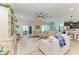 Bright and airy living space offering a relaxed atmosphere with a stylish rug and comfortable sofas at 9283 Newnan Cir, Port Charlotte, FL 33981