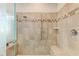 This bathroom features a glass shower with tile surround and dual shower heads at 9283 Newnan Cir, Port Charlotte, FL 33981