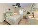 Comfortable bedroom featuring stylish furnishings and natural light at 9404 Arnaz Cir, Port Charlotte, FL 33981