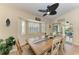 Cozy dining area with large windows and views of the pool at 9404 Arnaz Cir, Port Charlotte, FL 33981