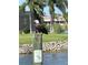 Majestic bald eagle perched on a piling in a waterfront community at 9404 Arnaz Cir, Port Charlotte, FL 33981