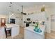 Modern kitchen featuring white cabinets, quartz countertops, and stainless appliances at 9404 Arnaz Cir, Port Charlotte, FL 33981