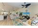 Bright and airy living room with comfortable seating, stylish decor, and plenty of natural light at 9404 Arnaz Cir, Port Charlotte, FL 33981