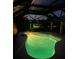 The outdoor pool is brightly lit at dusk, with an enclosed structure for easy enjoyment at 9404 Arnaz Cir, Port Charlotte, FL 33981